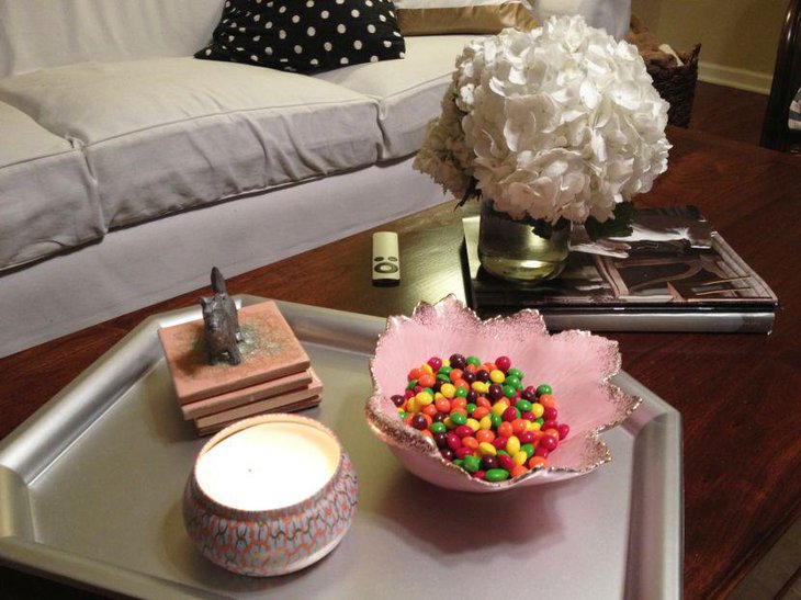 Gorgeous white floral decor on coffee table with silver tray