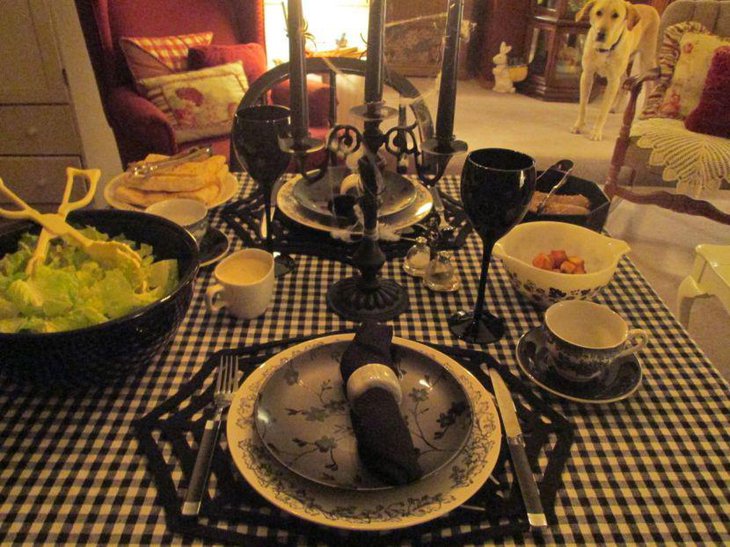 Gothic Halloween table with black candle holder and black candles