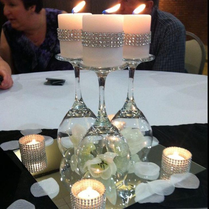Impressive DIY Wine Glasses On a Mirror Wedding Table Centerpiece With Candles and White Flowers