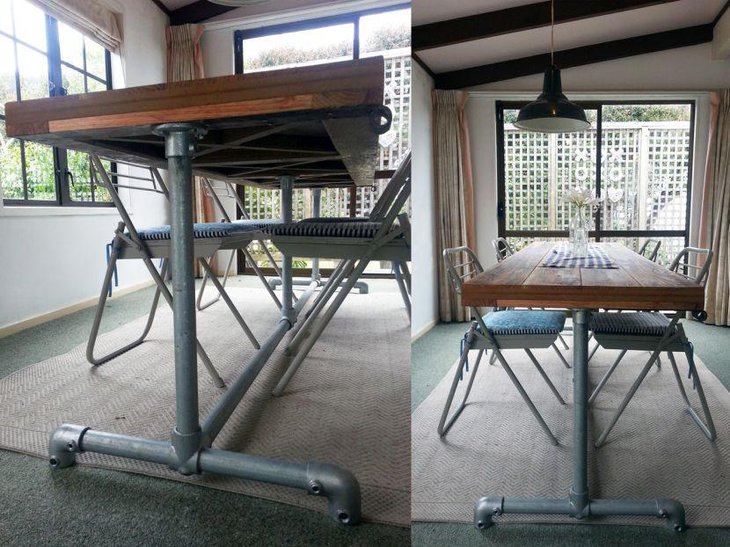 Industrial DIY dining table made of timber and pipes