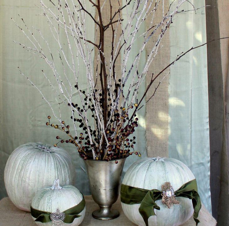 Innovative branch and berry floral winter table centerpiece