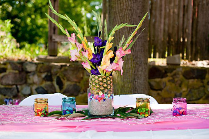 Kids summer birthday pineapple centerpiece with flowers