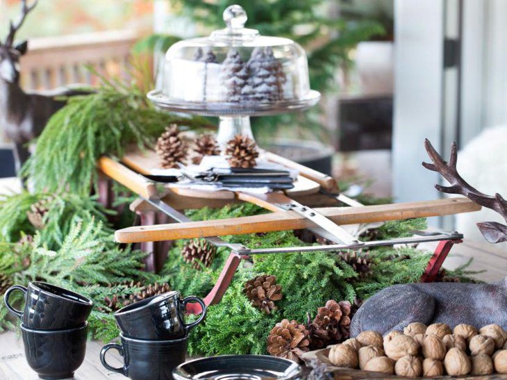 Layered green centerpiece with wooden setup for centerpiece for summer garden party