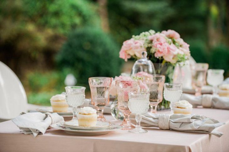 Light tones of pink embellish this bridal shower table