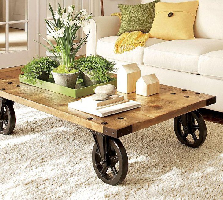 Modern coffee table decor with greens and flowers on a tray