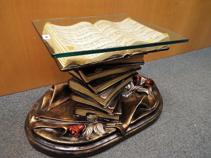 Musical themed coffee table with a base showing stacked up music books