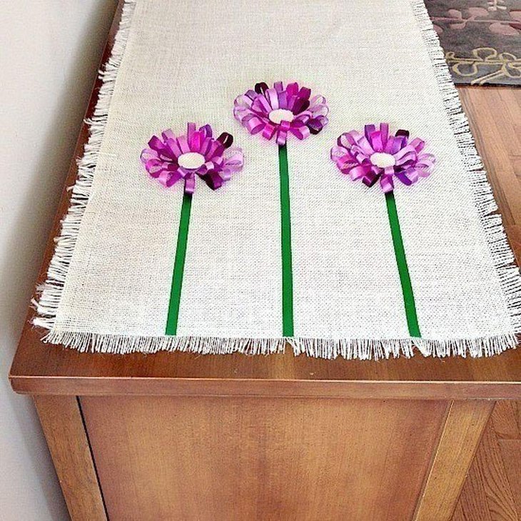 No sew table runner with purple ribbon flowers