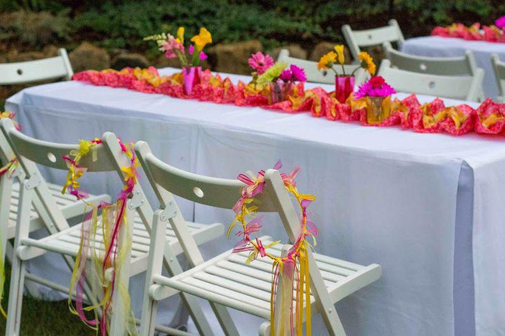 Orange and fuchsia summer birthday table decor