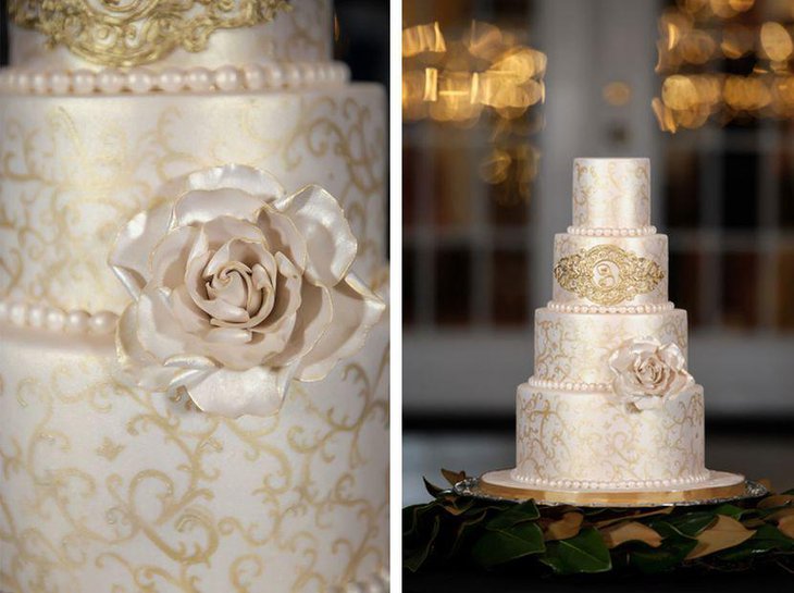 Ornamental pink and golden accented wedding cake decor