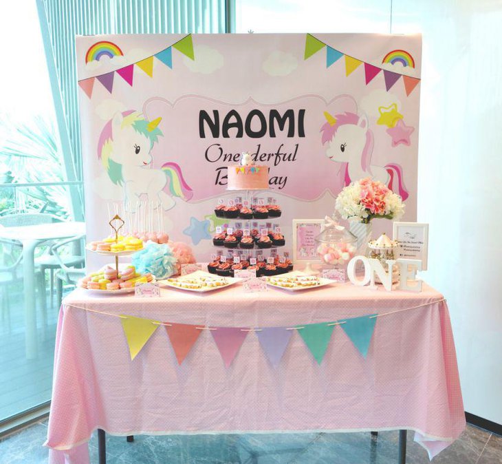 Pastel spring birthday table with flower decor