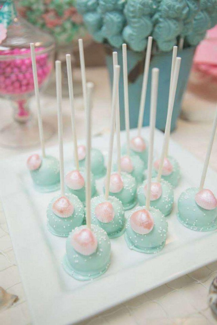 Pastel themed mermaid baby shower desserts table decor