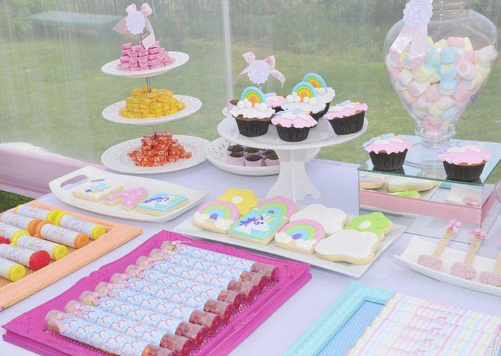 Pastel unicorn and rainbow dessert table decor