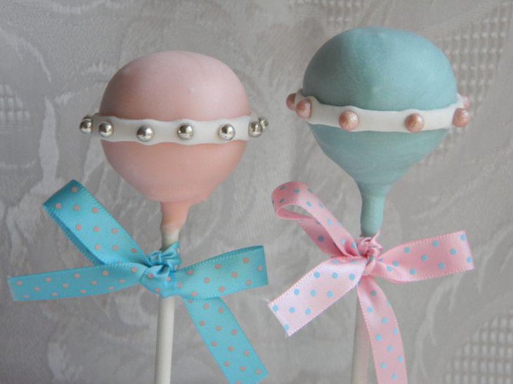Pink and blue marshmallow rattle favors for baby shower