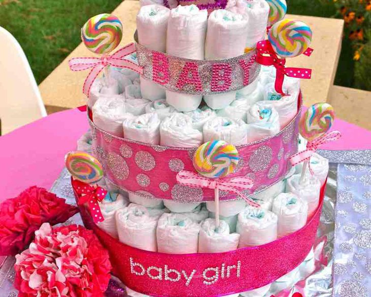 Pink bling diaper cake graced a table of its own