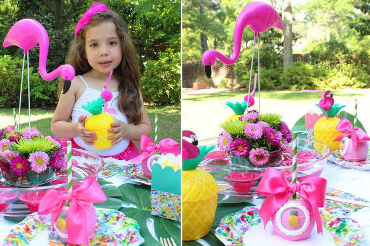 Pink floral centerpiece on summer birthday table