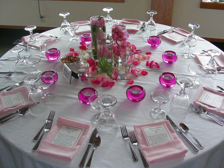 Pink themed candle decor for summer wedding table