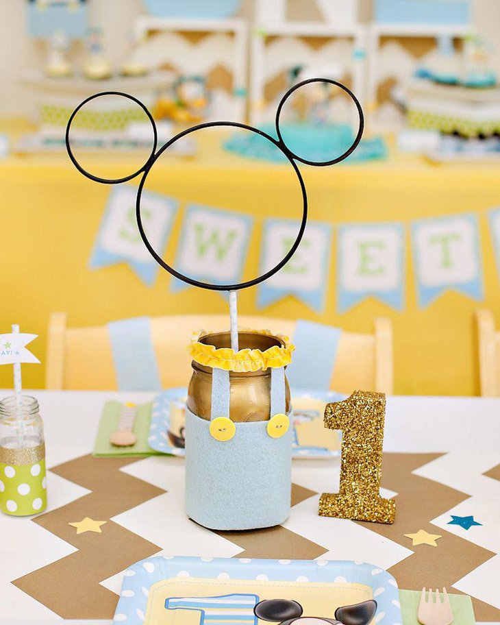 Playful Mickey Mouse first birthday table decor