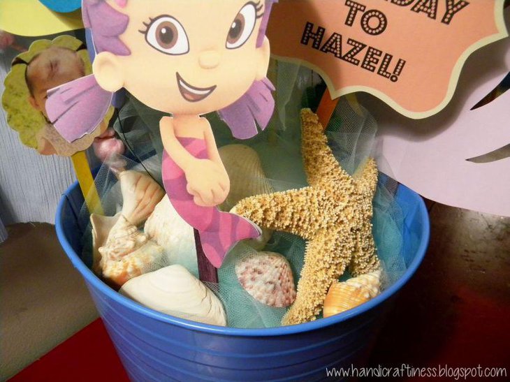 Pretty DIY Birthday Table Decor With Shells and Starfish