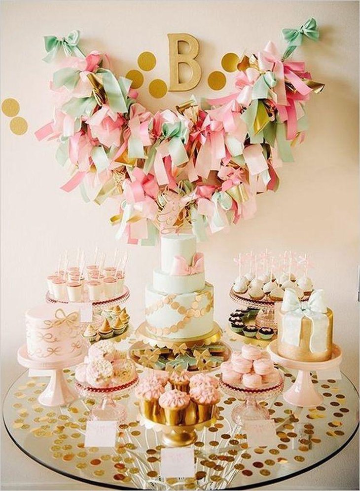 Pretty mint gold and blush dessert table setting