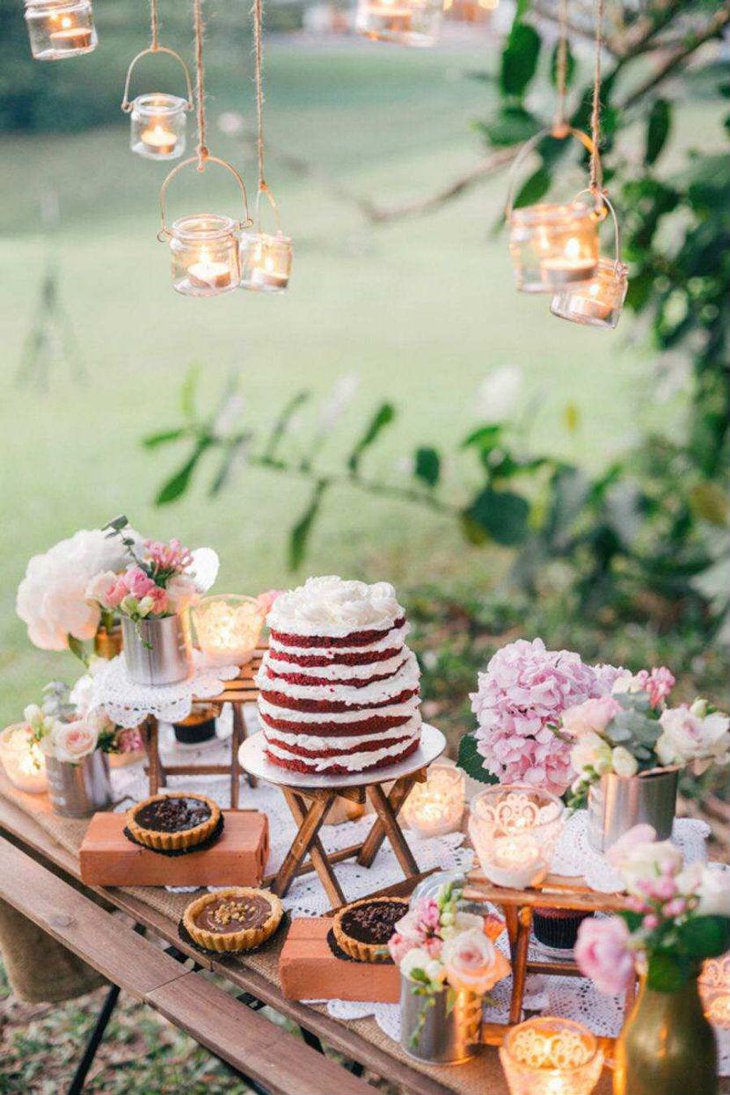Pretty outdoor dessert table with rustic flavour