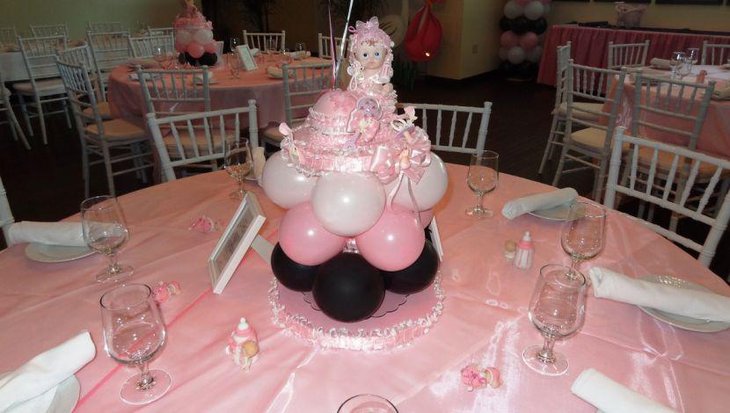 Princess baby shower decoration idea with lovely doll and balloons