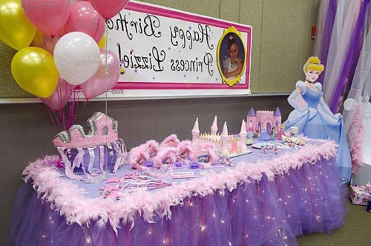 Purple accented birthday party table decor