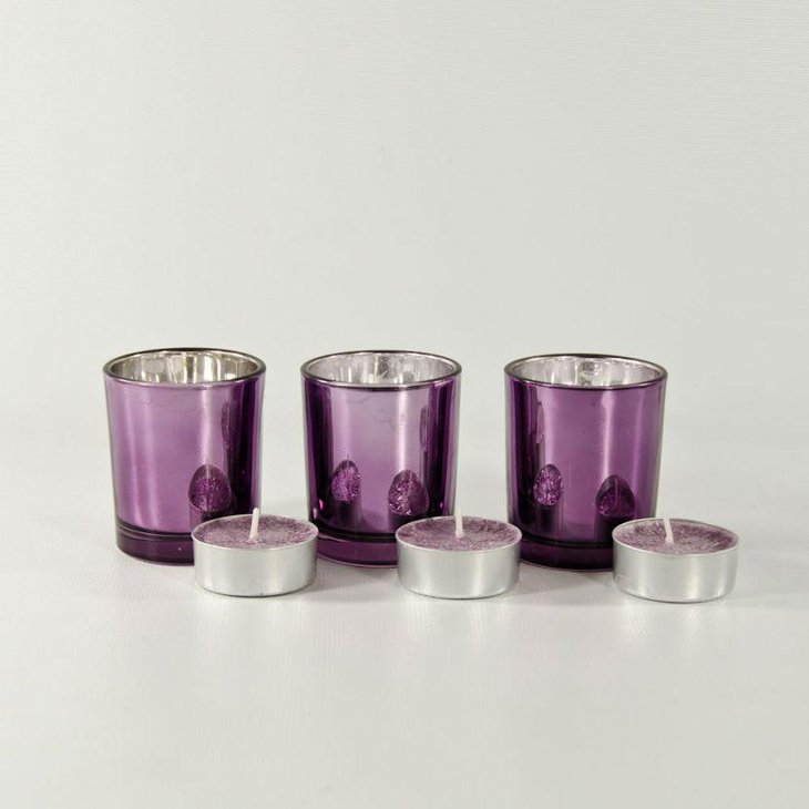 Purple votive candle holders for party table decoration