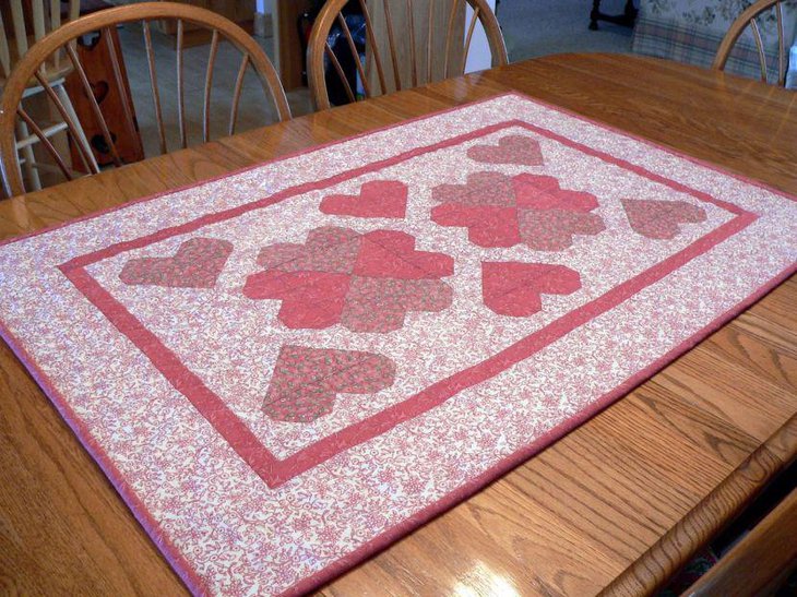 Quilted Valentines table runner with heart patterns
