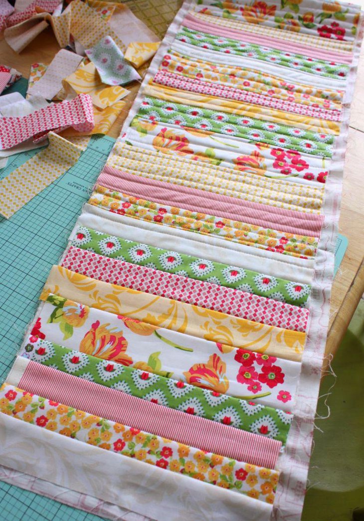 Quilted Valentines table runner with pink and green floral accents