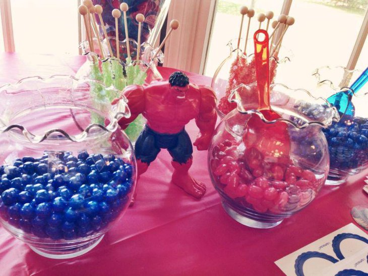 Red and blue Avengers candy layout on birthday table