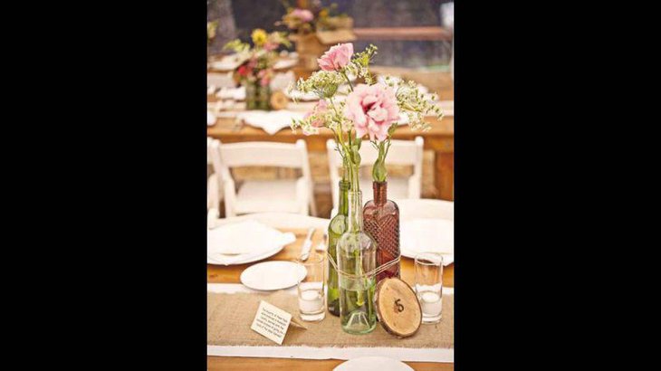 Refreshing DIY Wine Bottle Centerpieces Tied With Twine