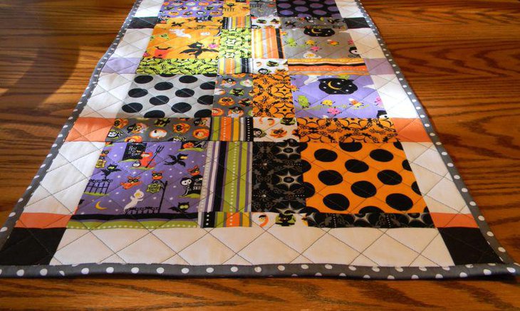 Reversable quilted table runner for Halloween