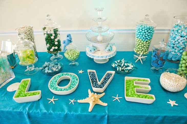 Romantic blue beach wedding candy table