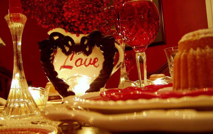 Romantic Valentines table with love decor and crystal glass