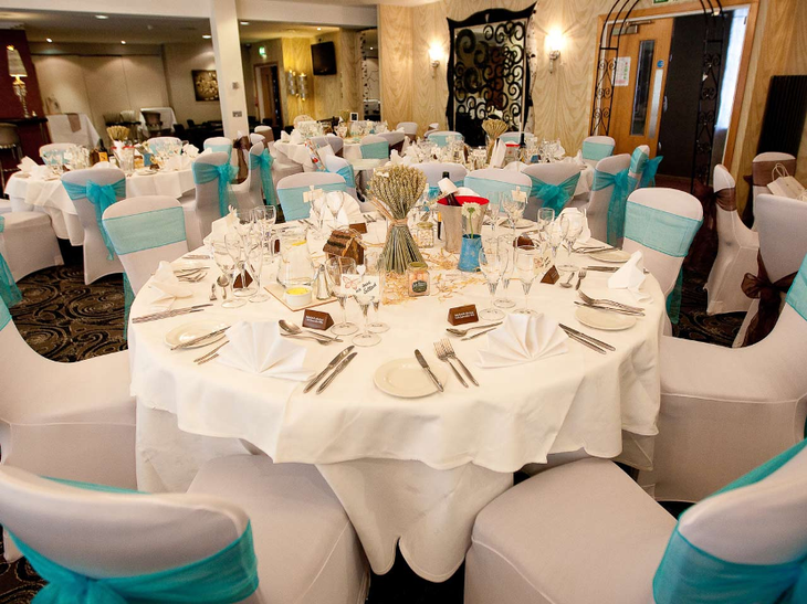 Round Wedding Tables Donned In Bright blue Colors