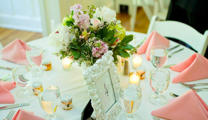 Round Wedding Tables with a beautiful flower centerpiece