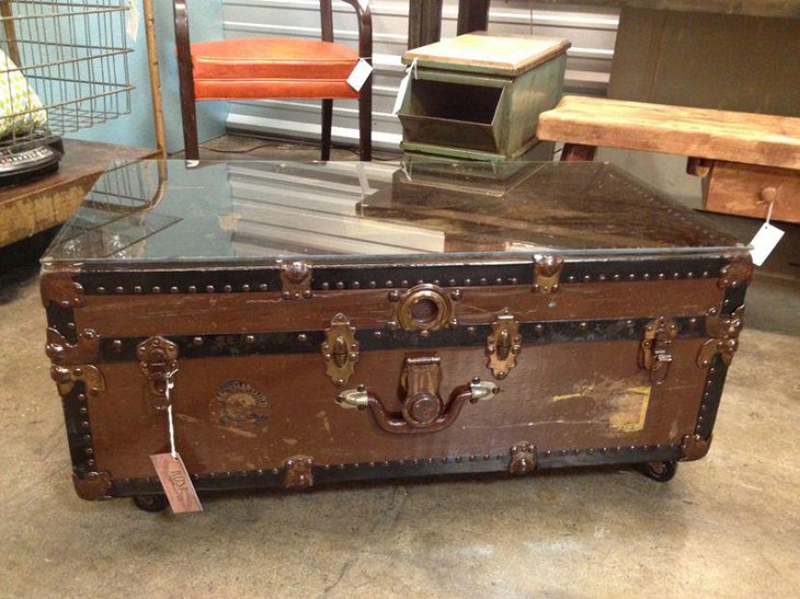 Rustic trunk coffee table with glass top