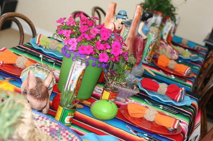 Serape decor along with cactus and flowers