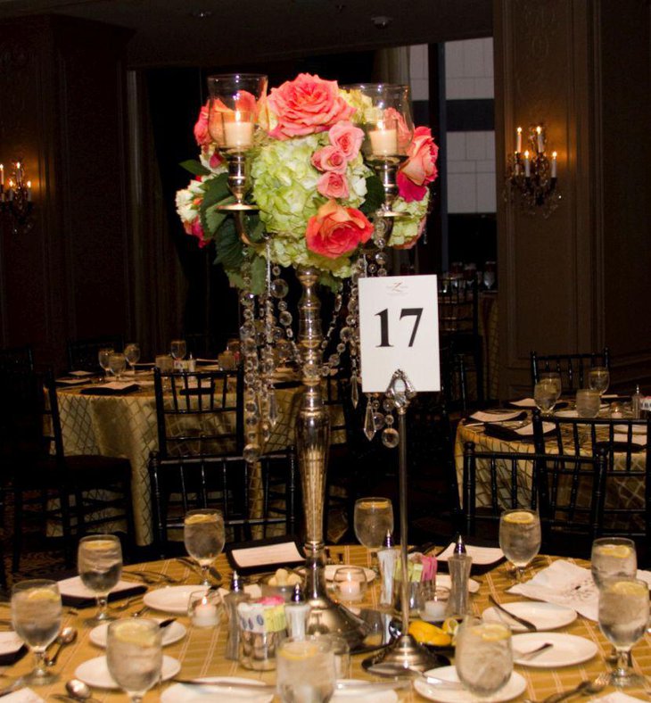 Silver candelabra centerpiece with hanging crystals