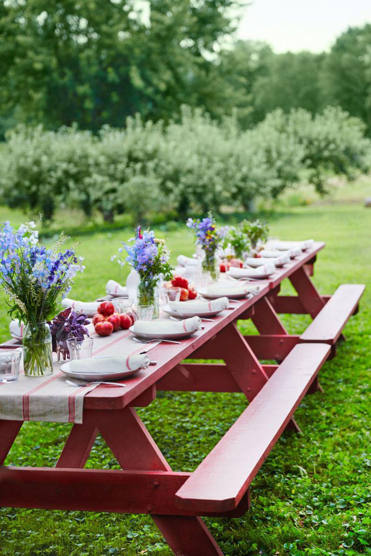 Simple rustic table setup for garden party