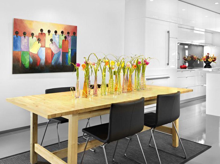 Smart dining table with unique silk flower arrangement