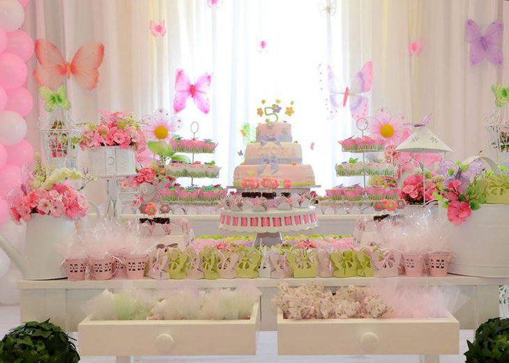 Soothing summer birthday table with butterfly decor