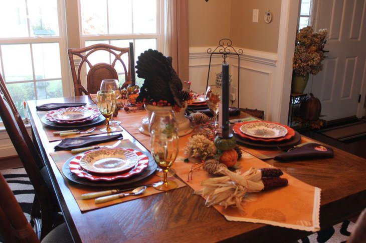 Stacked up China plates add neatness to this breakfast table