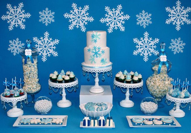 Stunning blue candy table idea with snowflakes