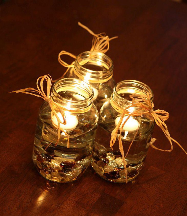 Stunning glass jar candle centerpieces for wedding table