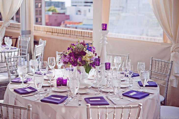 Stunning purple table decorations for reception party