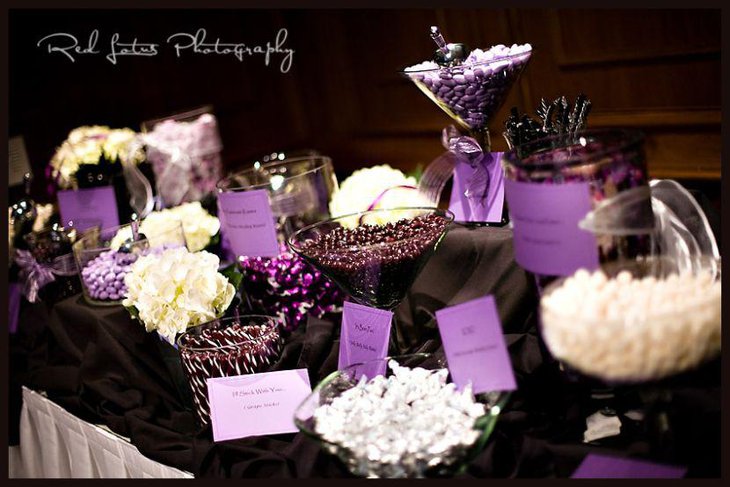 Stunning wedding candy bar ideas in purple and white accents