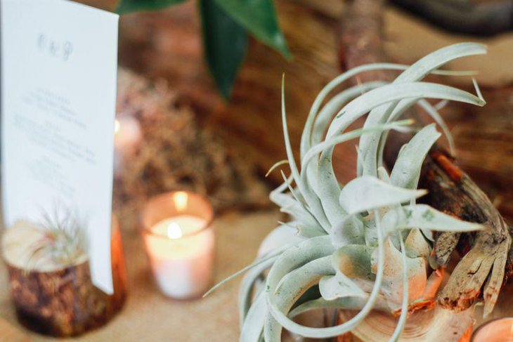 Succulent and votive wedding table decor for summer