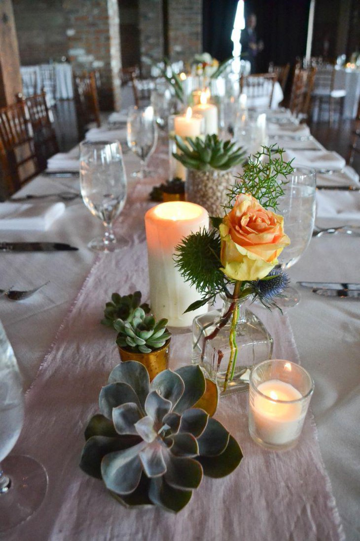 Summer wedding table decor with succulents and candles