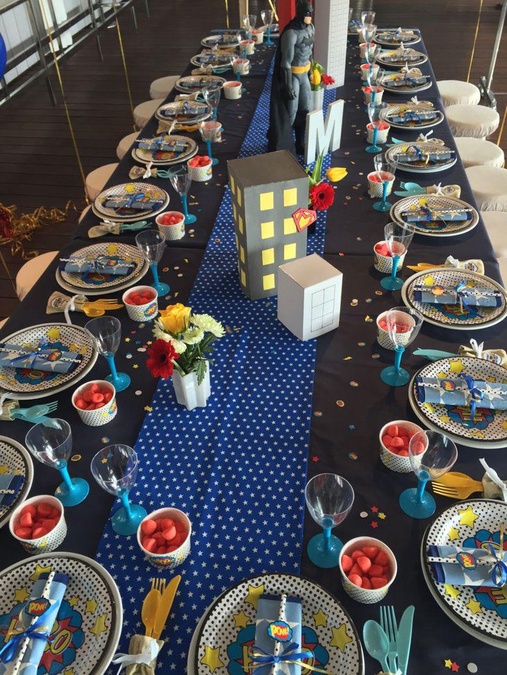 Superhero birthday table decor with flowers